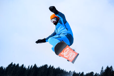 Snowboarding high jump photo