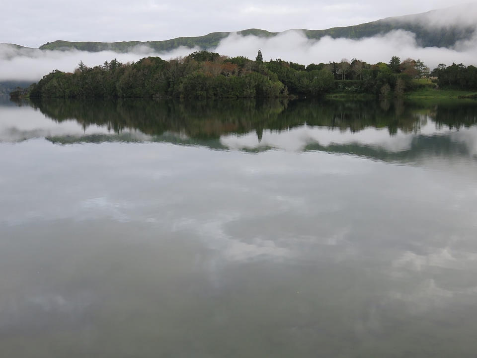 Clouds grey volcanic lake