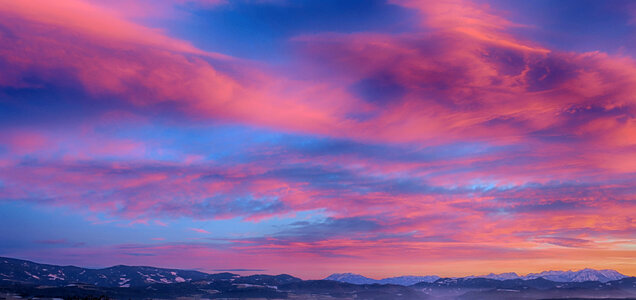 Winter Sunset over Mountains photo