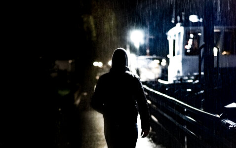 Man walking in the rain photo