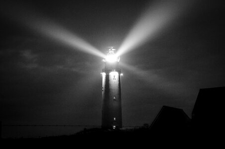Lighthouse at night in black and white