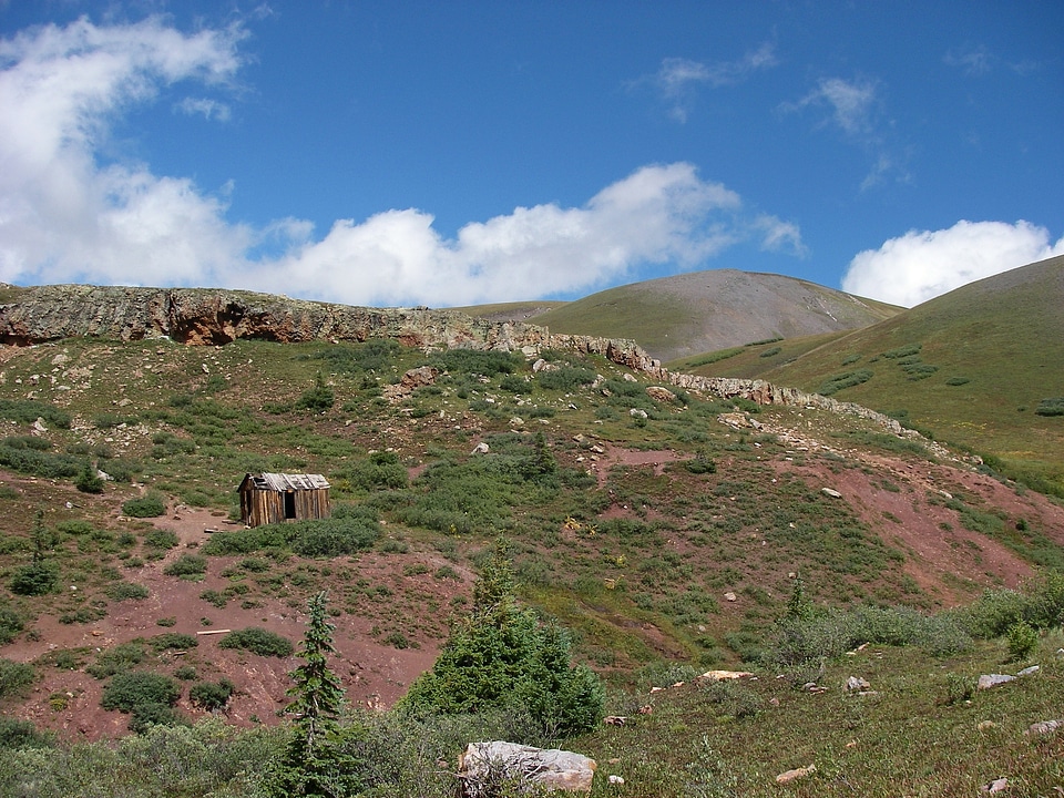 Mine shack sky clouds
