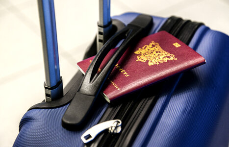 Passport and suitcase photo