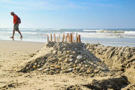 Beach castle with shells photo