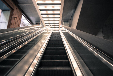 Escalators at a train station photo