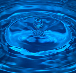 Blue drop of water photo
