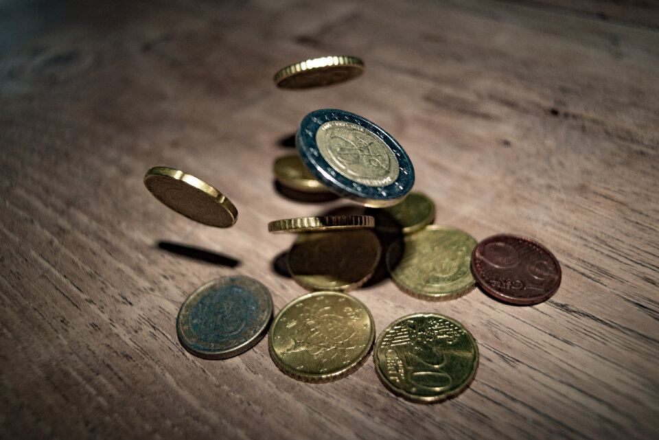 Falling Euro coins