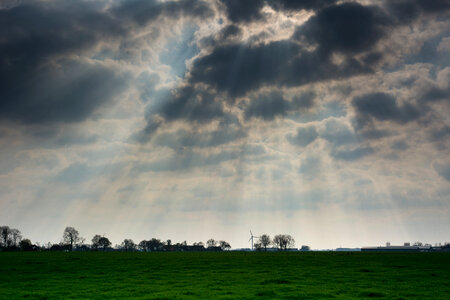 Sunbeams through the clouds photo