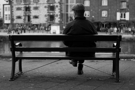 Man on a bench photo