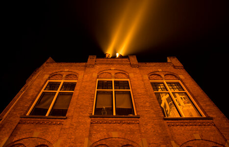 Building with search lights photo