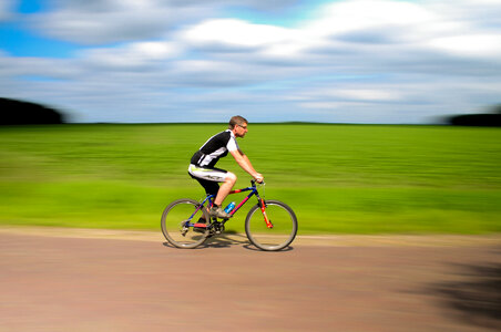 Cyclist on the move photo