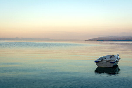 Calm Morning Sea and Boat photo