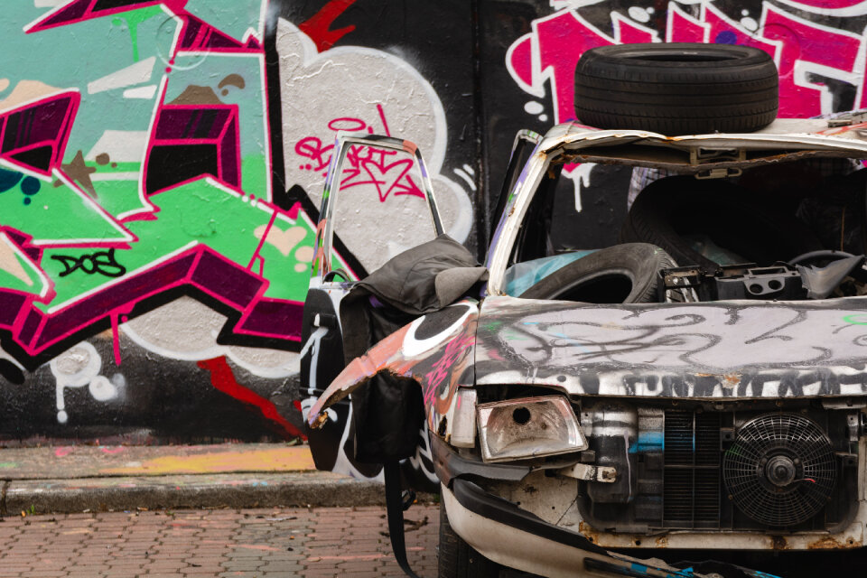 Destroyed Car Painted with Graffiti