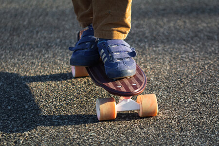 Children on a Penny Board