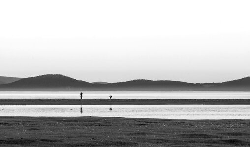 Silhouettes by the Lake – Black & White photo