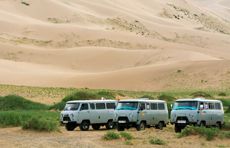 UAZ Vans on Sand Dunes photo
