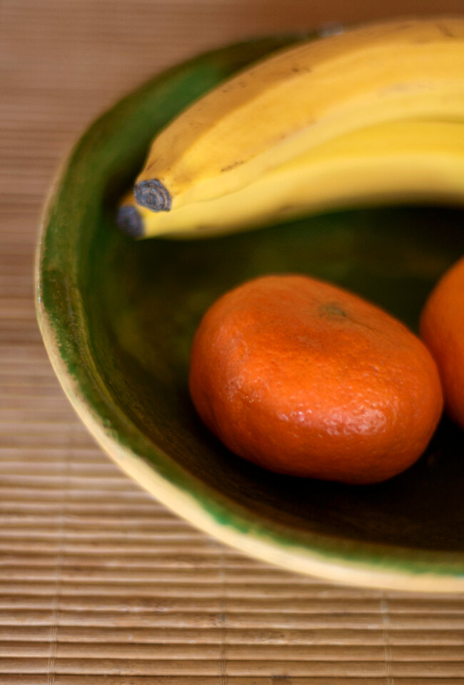 Still life with fruits in ceramic bowl