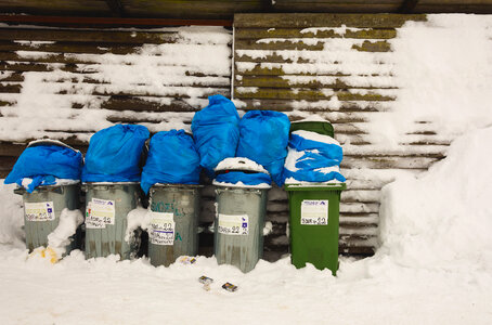 Dustbins covered with snow
