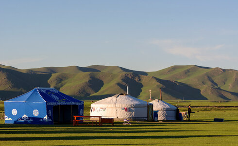 Mongolian countryside with yurts photo