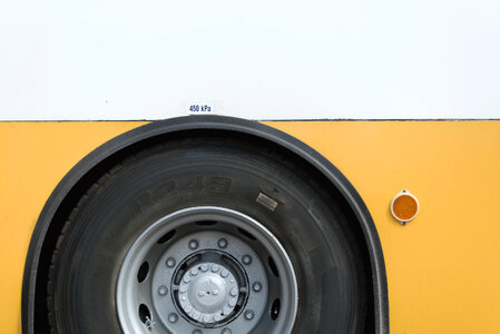 Yellow bus tyre photo