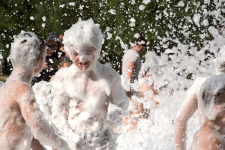 Children have fun in foam