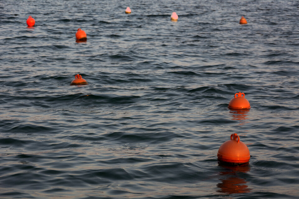 The Orange Buoys On A Sea Surface