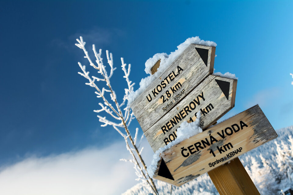 Tourist Signs On Trail In Mountains