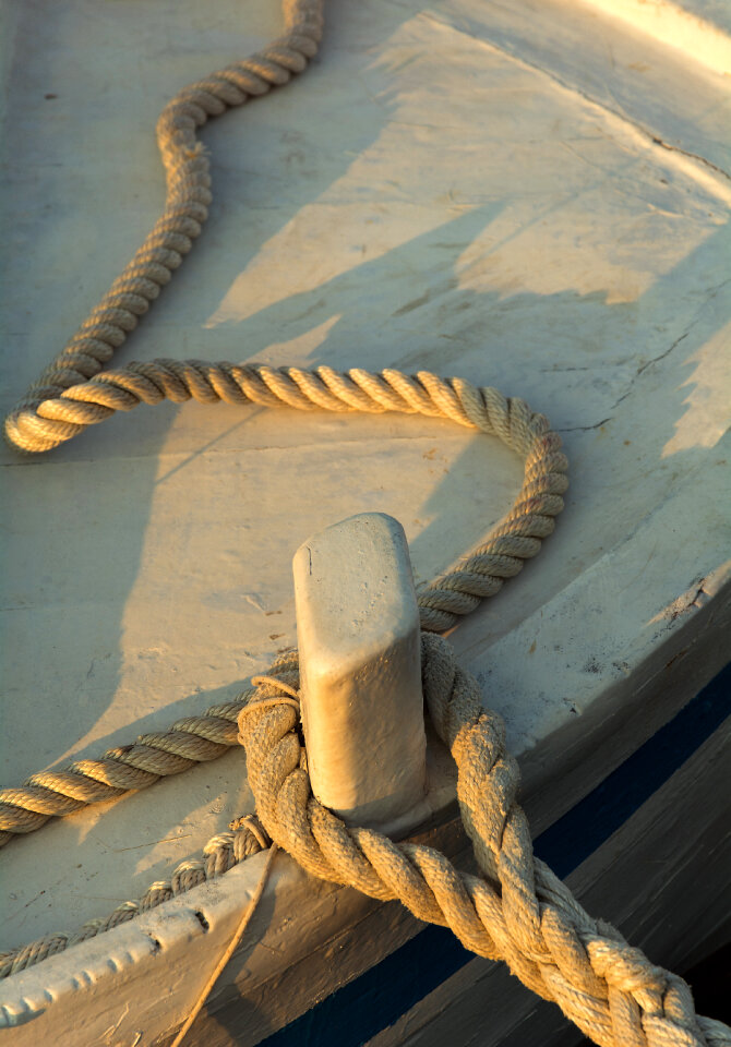 Rope aboard a wooden boat photo