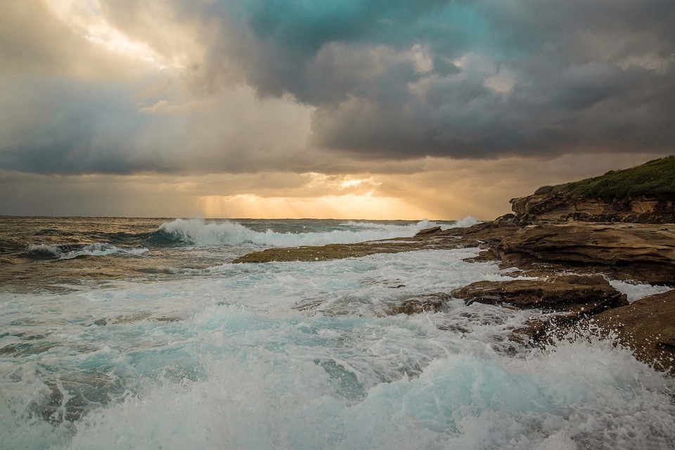 Seashore sunrise rocks