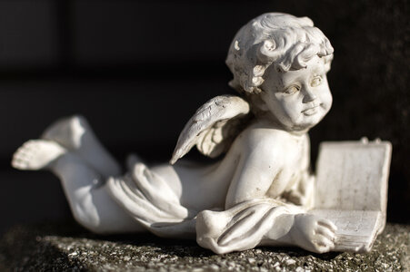 Statue of an Angel on a Grave photo