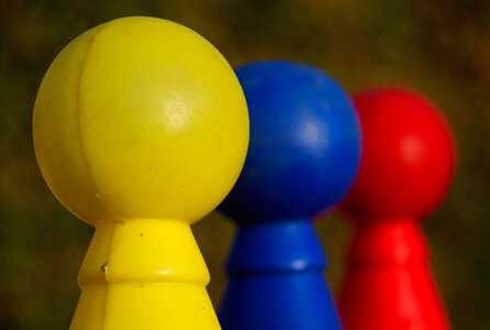 Three Colored Plastic Skittles