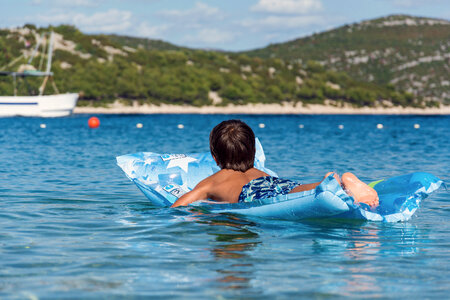 Children on Inflatable Sunbed