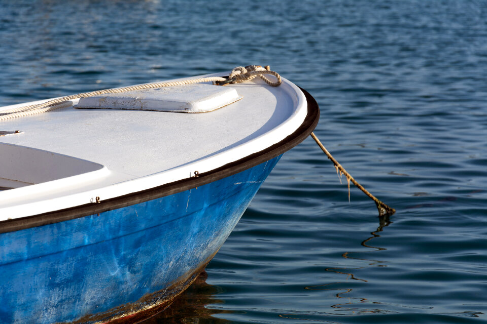 small blue sea dinghy