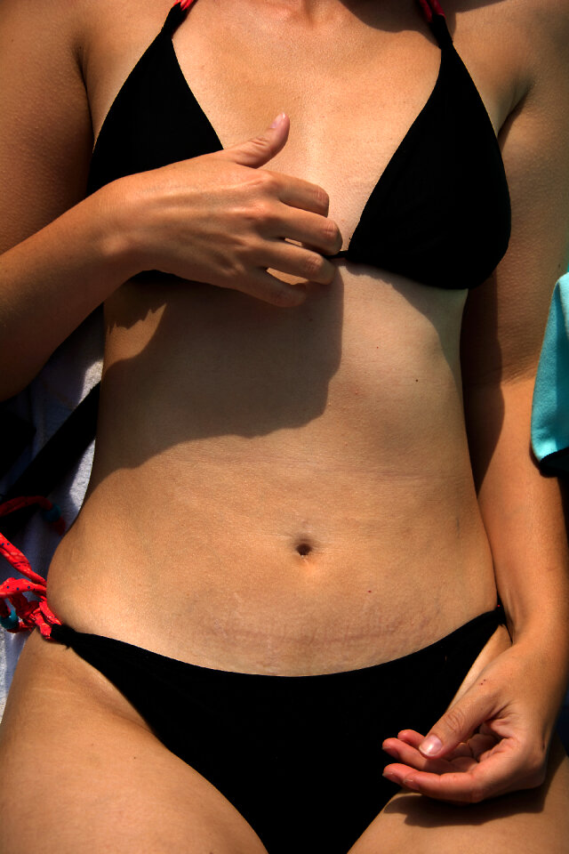 Detail of woman body in black bikini