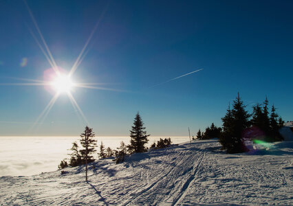 Snow and blue sky photo