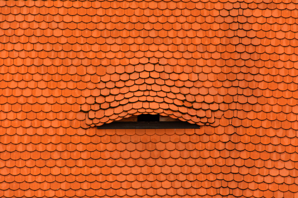 Old Dormer Window On Tiled Roof
