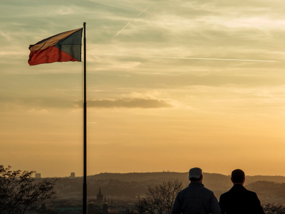 Two men looking to Prague