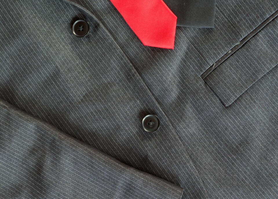 Dark Men’s Jacket With A Red Tie