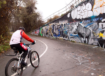 Cyclist With Graffiti Wall photo