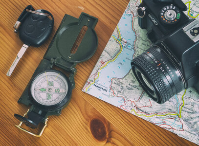 Travel Map, Car Key, Compass And Camera