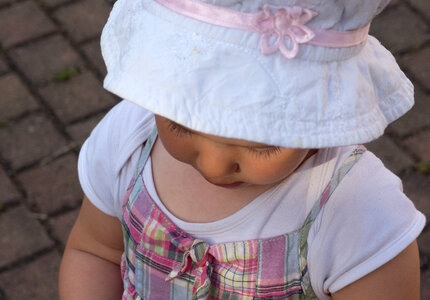 Little Girl In White Hat photo