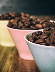 Three cups with coffee beans photo