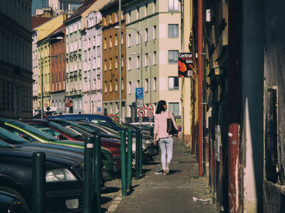 Girl walking on the street of Prague photo