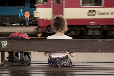 Girl at train station photo
