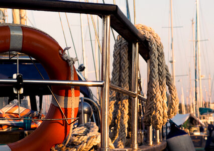 Railing, rope and lifebuoy on yacht