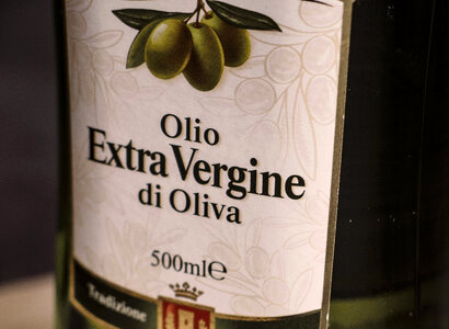 Olive oil in bottle photo