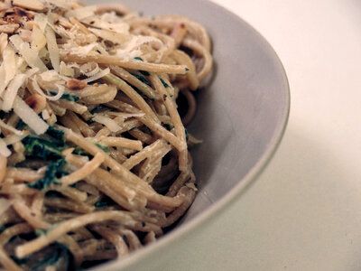 Italian food – spaghetti with parmesan cheese photo