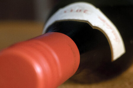 Red wine bottle close-up photo
