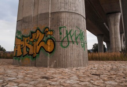 Graffiti under a bridge photo