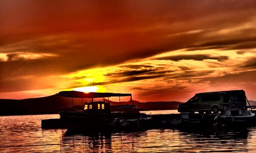 Red Sunset Over The Sea Boats